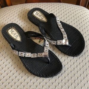 Women black flip flops
